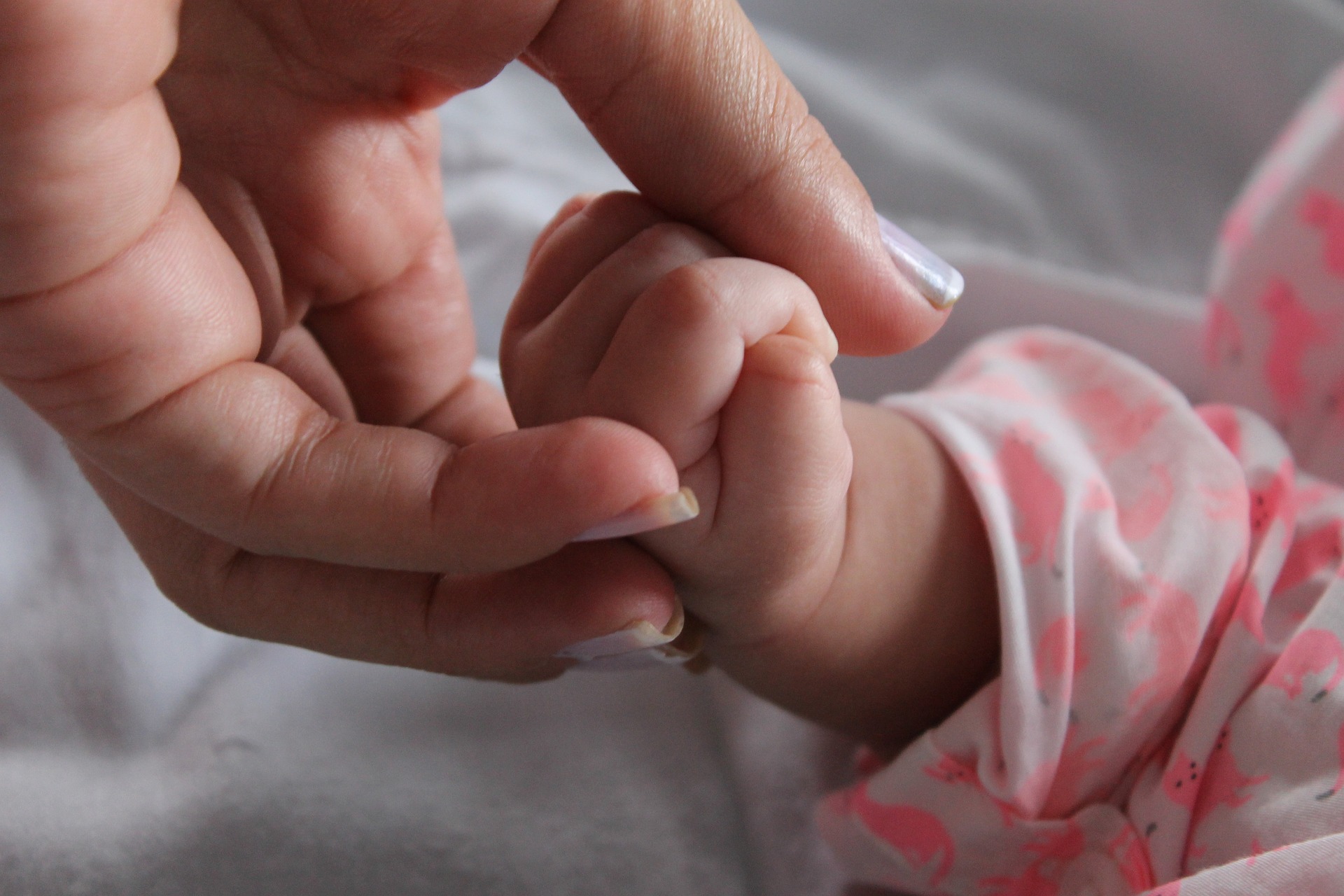 baby and mom hand 